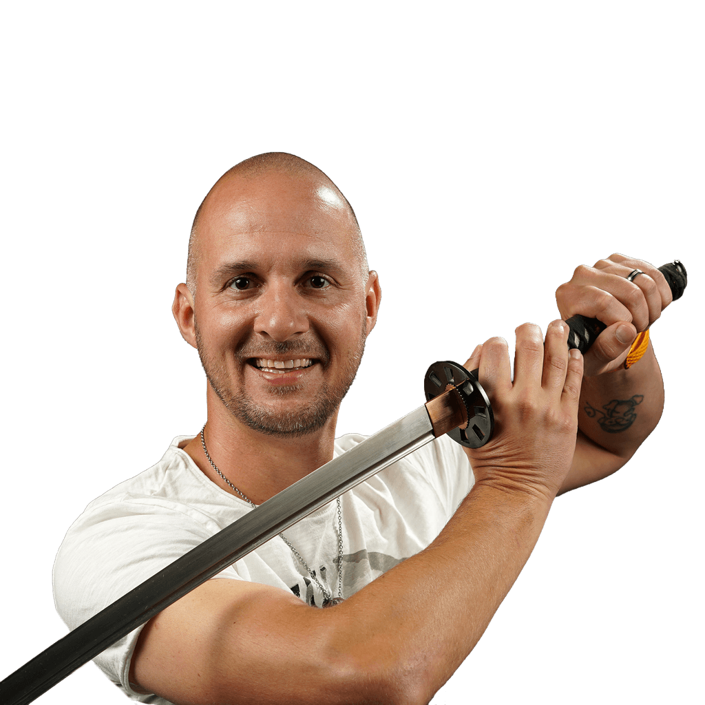 Michaël holding a katana on a colorful background